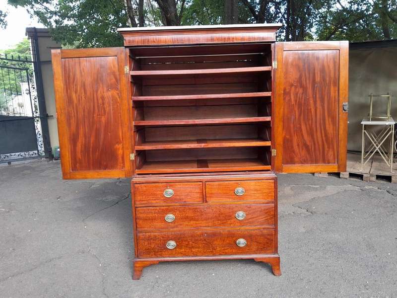 An Antique Circa Victorian Circa 1890s Mahogany Linen Press with Brass Handles  Five Shelves a...