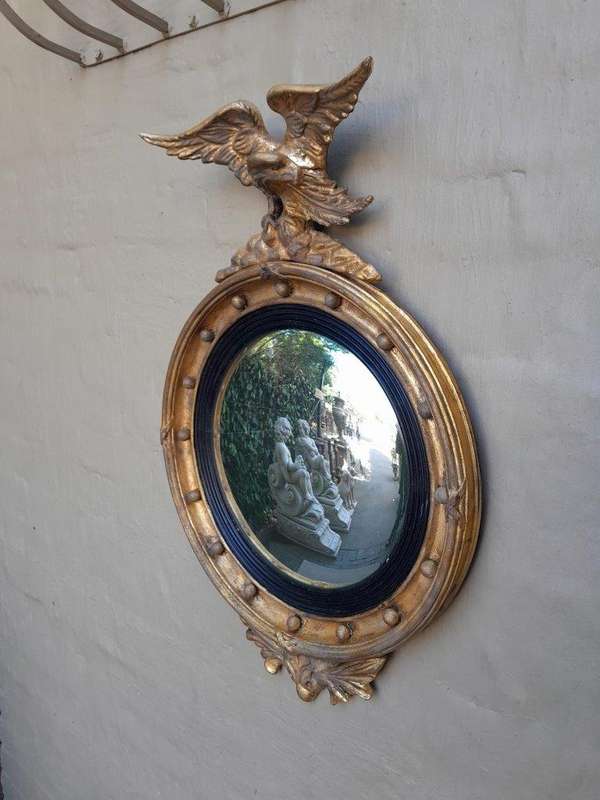An Antique Circa 1820s Large Regency Style gilt-bronze-Eagle Concave Mirror