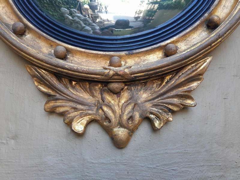 An Antique Circa 1820s Large Regency Style gilt-bronze-Eagle Concave Mirror
