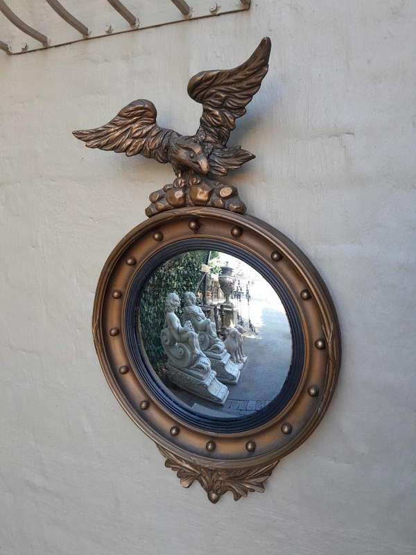 A 20th Century Regency Style Convex Mirror with Eagle