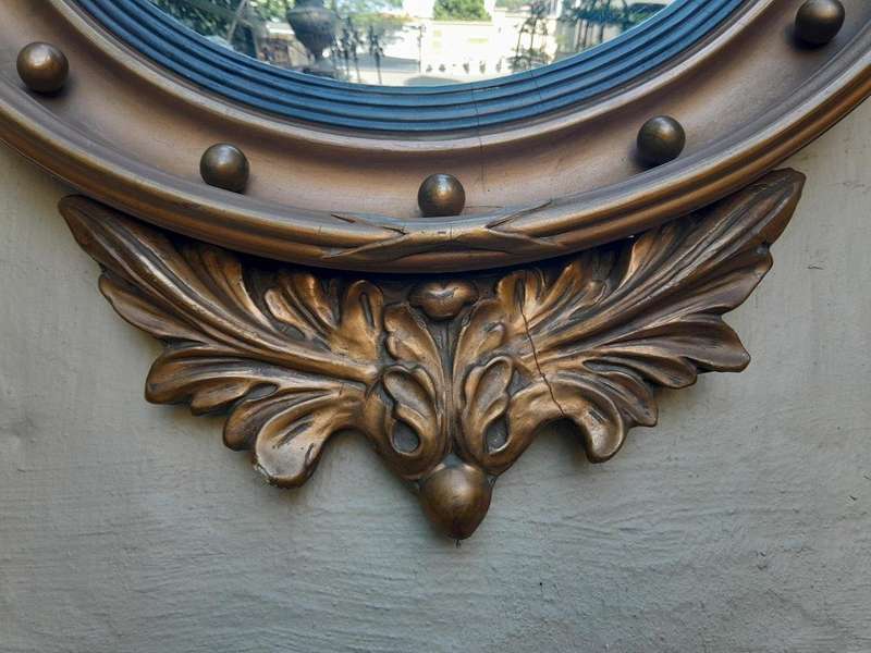 A 20th Century Regency Style Convex Mirror with Eagle