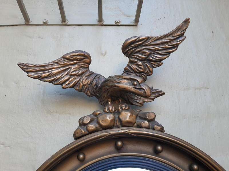 A 20th Century Regency Style Convex Mirror with Eagle