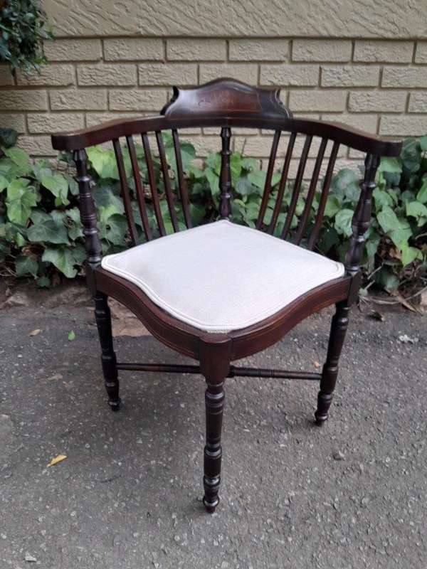An Antique Edwardian Carved Mahogany and Inlaid Corner Chair