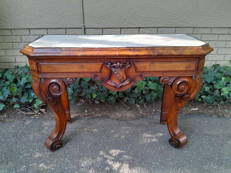 A Victorian Circa 1850s Carved Rosewood Console/Drinks Table with Cream Marble Top