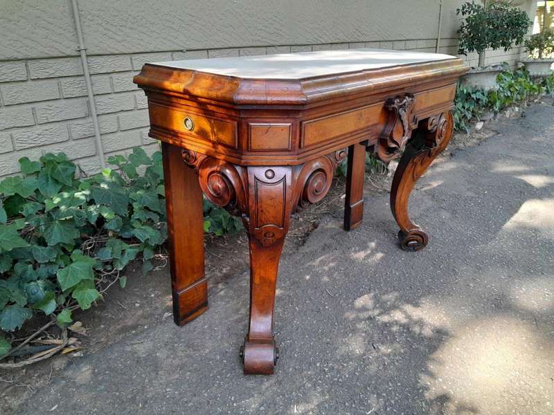 A Victorian Circa 1850s Carved Rosewood Console/Drinks Table with Cream Marble Top