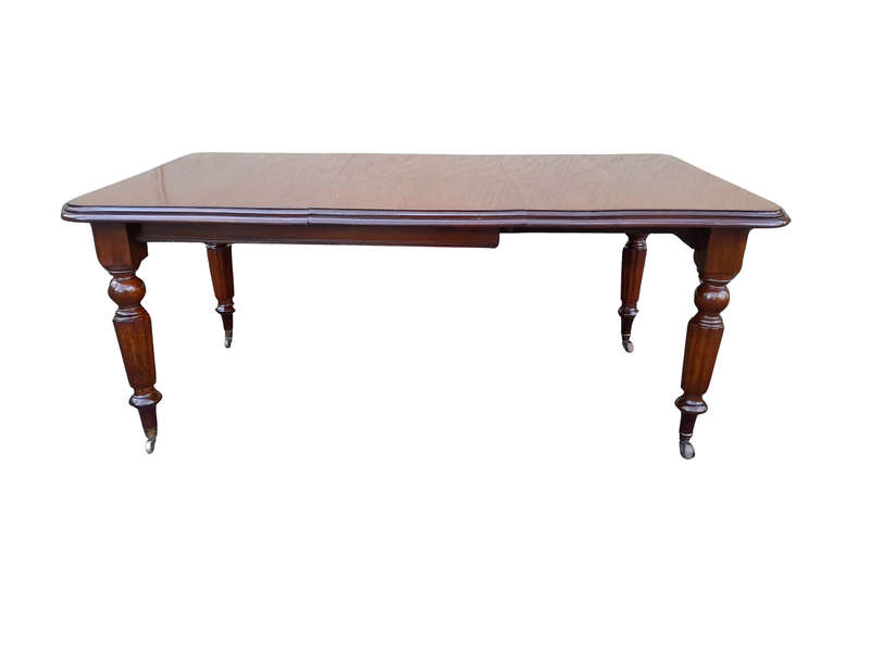 A 20th Century Victorian Style Mahogany Extending Dining Table Seats 8 on Brass Castors