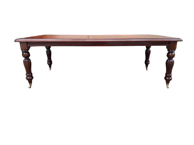 A 20th Century Victorian Style French Polished Mahogany Dining Table of Large Proportion on Brass...
