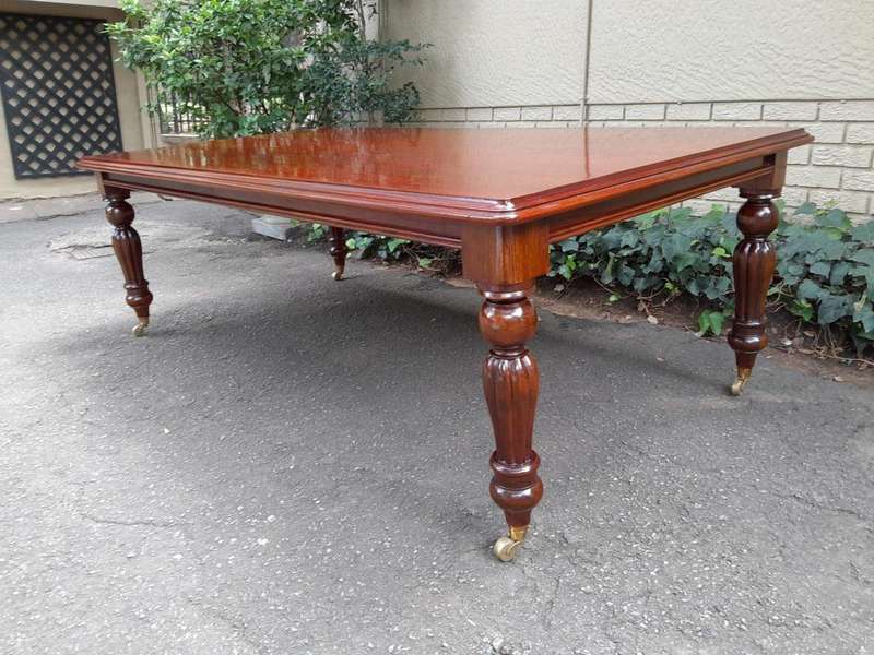 A 20th Century Victorian Style French Polished Mahogany Dining Table of Large Proportion on Brass...