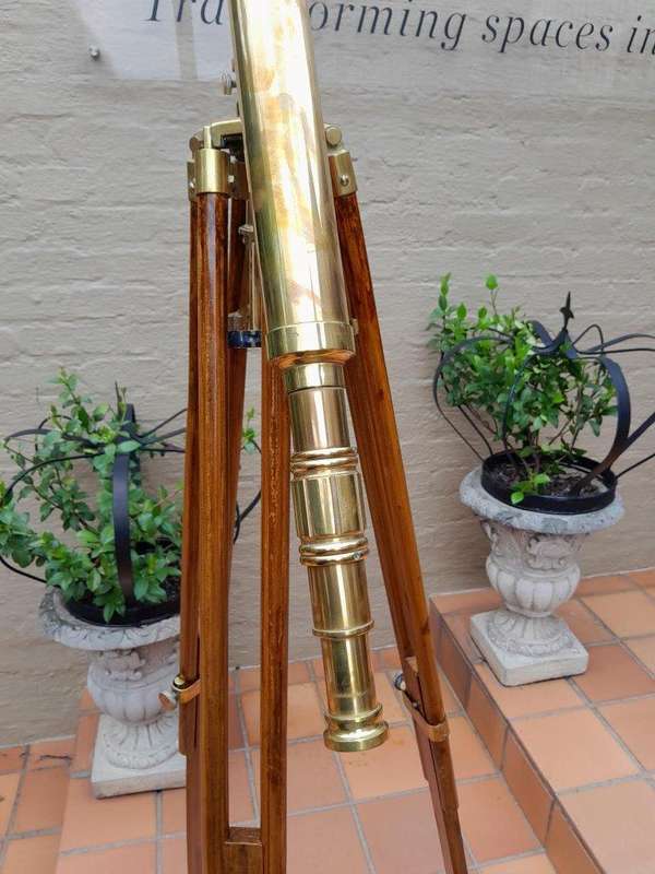A 20th Century Brass Telescope on Brass and Wood Tripod Stand