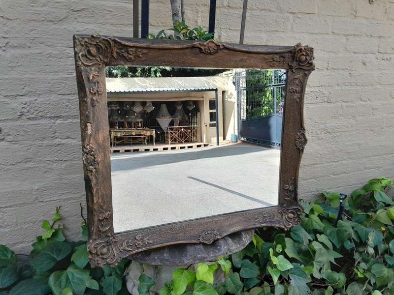 An Antique Ornately Carved and Hand- Painted  Mirror