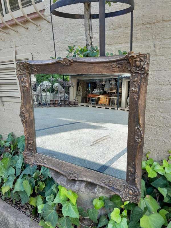 An Antique Ornately Carved and Hand- Painted  Mirror