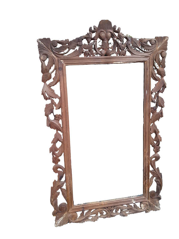 An Ornately Carved And Bleached To A Contemporary Finish Wooden Mirror
