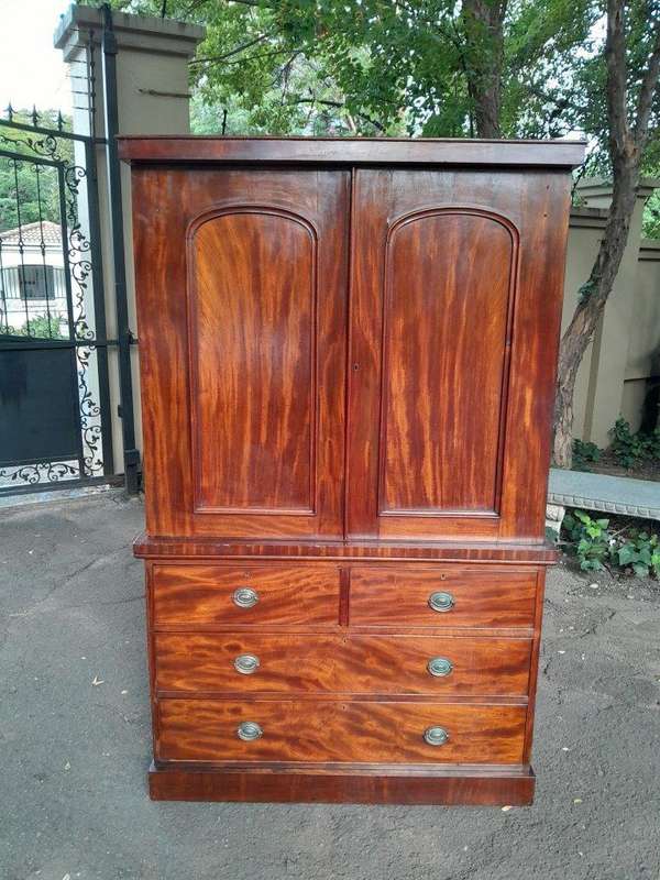 A 20th Century Flame Mahogany Linen Press