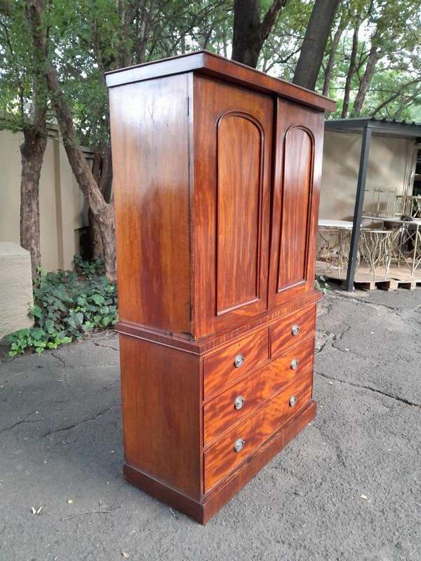 A 20th Century Flame Mahogany Linen Press