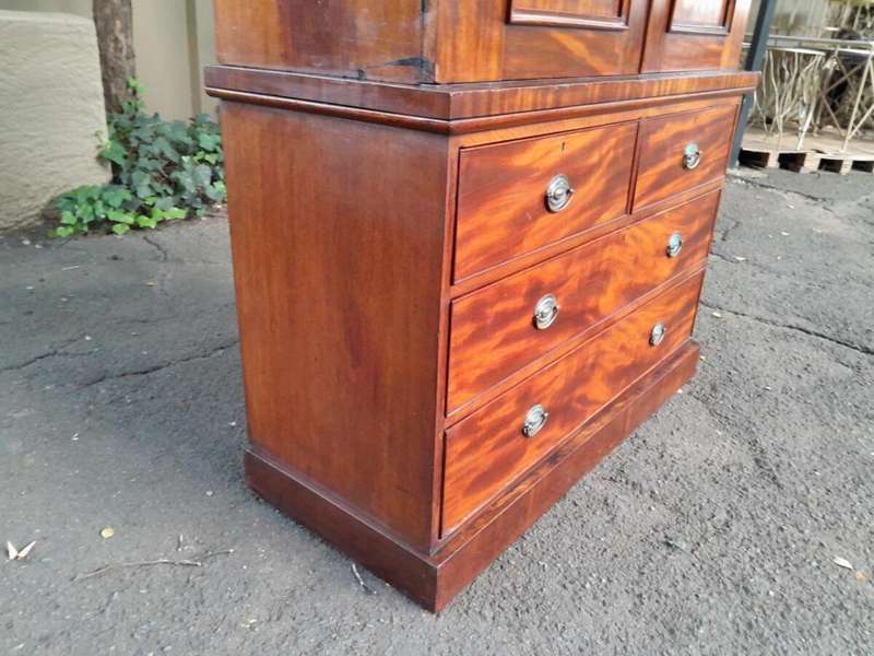 A 20th Century Flame Mahogany Linen Press