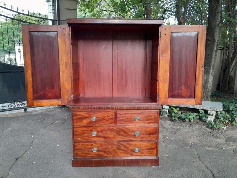 A 20th Century Flame Mahogany Linen Press