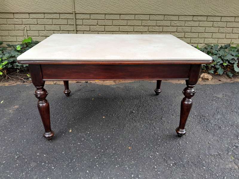 A 20th Century English Mahogany French Polished Table / Drinks Table With A Cream Marble Top