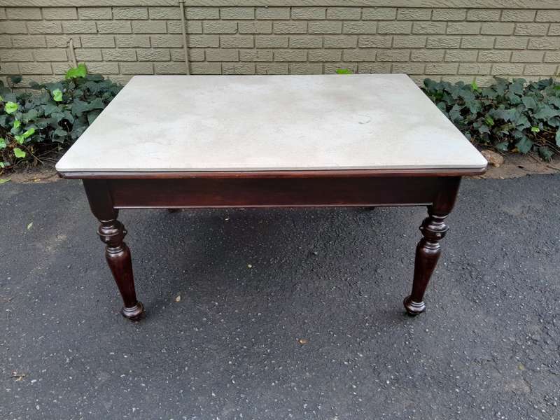 A 20th Century English Mahogany French Polished Table / Drinks Table With A Cream Marble Top