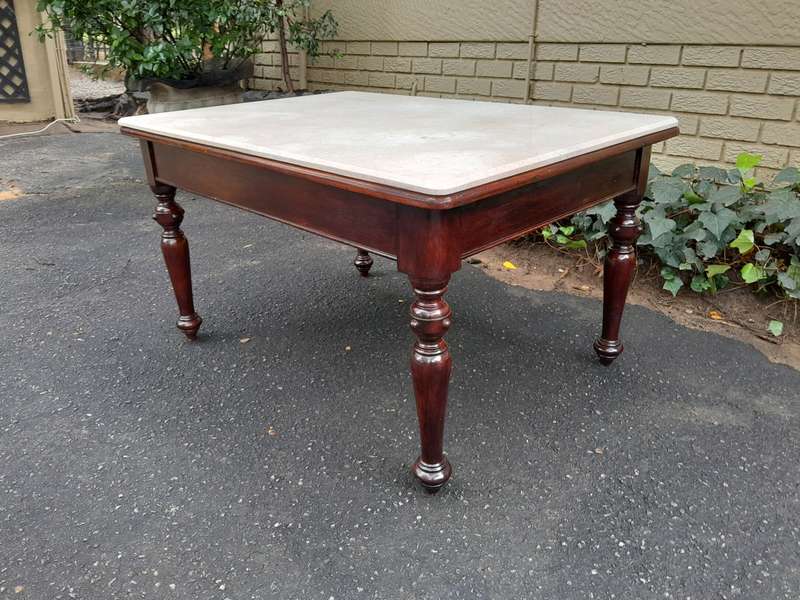 A 20th Century English Mahogany French Polished Table / Drinks Table With A Cream Marble Top