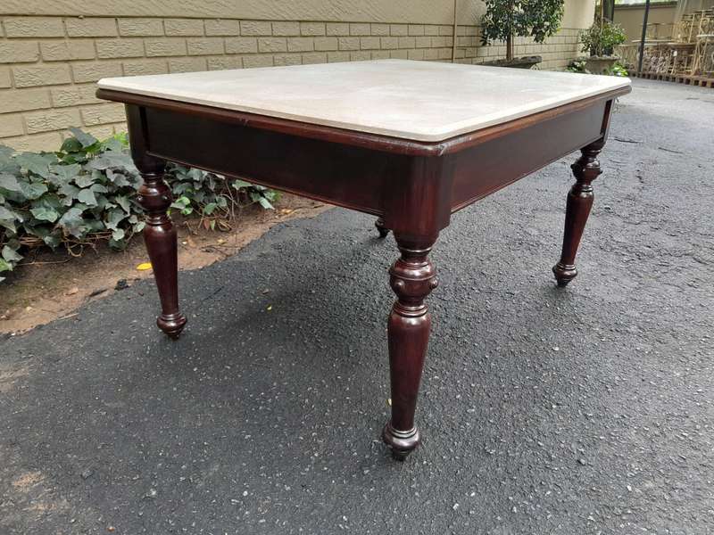 A 20th Century English Mahogany French Polished Table / Drinks Table With A Cream Marble Top