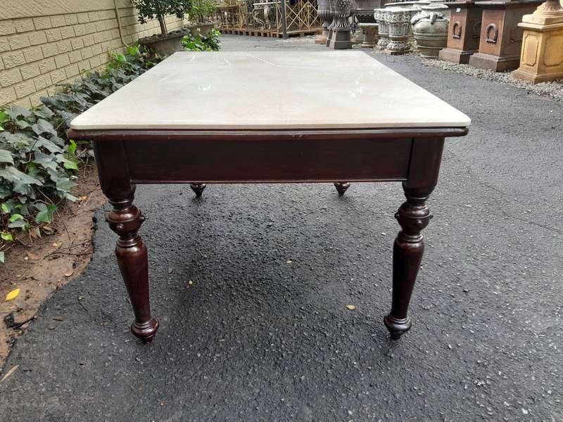 A 20th Century English Mahogany French Polished Table / Drinks Table With A Cream Marble Top