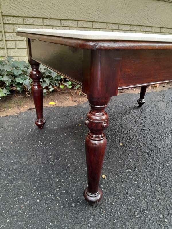 A 20th Century English Mahogany French Polished Table / Drinks Table With A Cream Marble Top