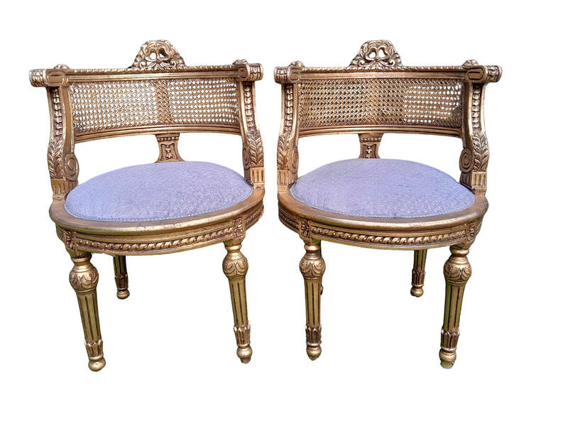 A Pair of French Louis XVI Style Carved and Rattan Chairs