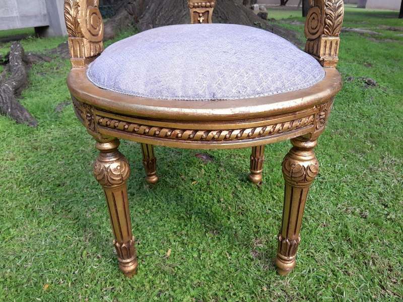 A Pair of French Louis XVI Style Carved and Rattan Chairs