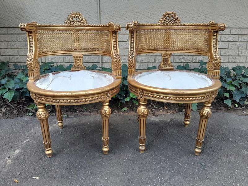 A Pair of French Louis XVI Style Carved and Rattan Chairs