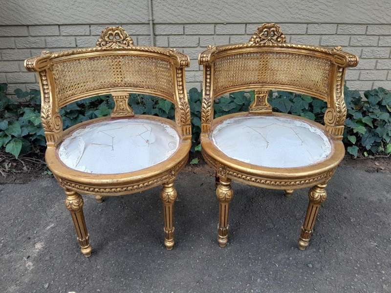 A Pair of French Louis XVI Style Carved and Rattan Chairs
