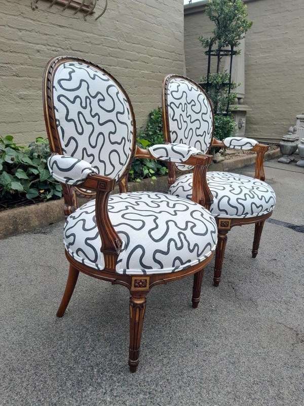 A 20th Century Pair Of French Louis XVI Style Walnut Chairs