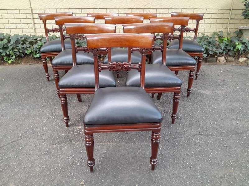 An Antique English Victorian Set Of Ten Mahogany Carved Dining Chairs Upholstered In Leather