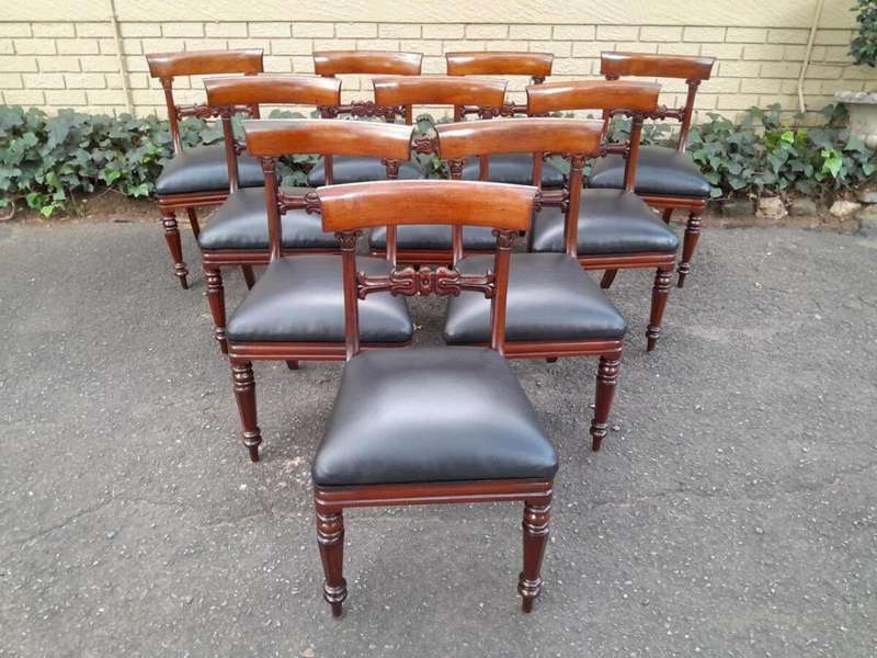 An Antique English Victorian Set Of Ten Mahogany Carved Dining Chairs Upholstered In Leather