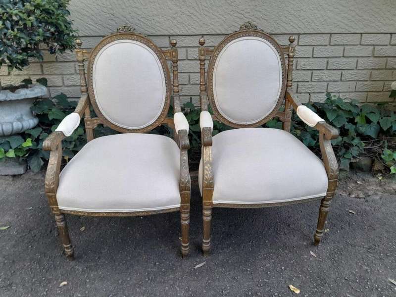 A 20th Century French Louis XV Style Gilded Armchairs