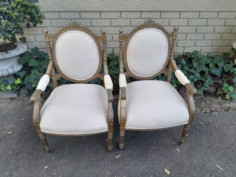 A 20th Century French Louis XV Style Gilded Armchairs