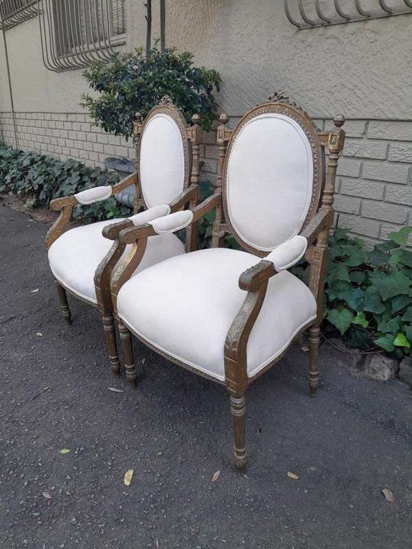 A 20th Century French Louis XV Style Gilded Armchairs