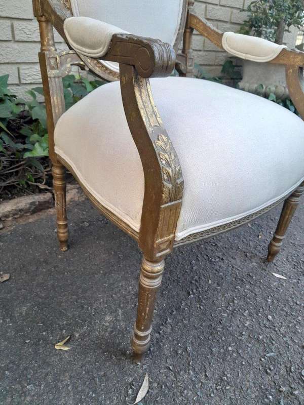 A 20th Century French Louis XV Style Gilded Armchairs