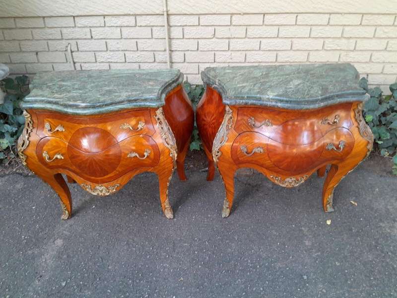 An  Antique 19th Century Pair of French Walnut Bombe Chest of Drawers with Marble tops