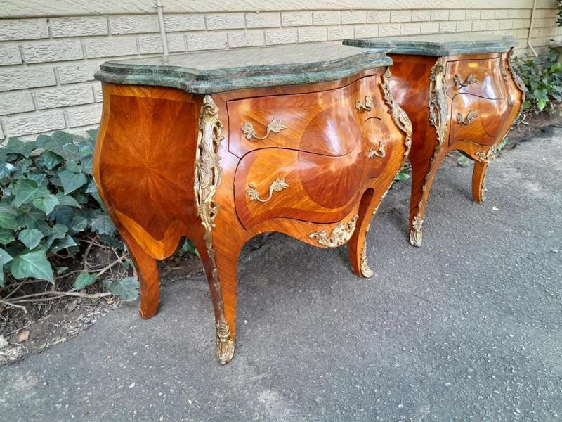 An  Antique 19th Century Pair of French Walnut Bombe Chest of Drawers with Marble tops