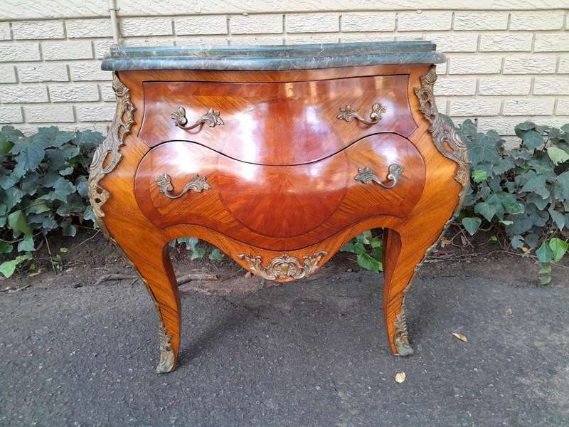 An  Antique 19th Century Pair of French Walnut Bombe Chest of Drawers with Marble tops