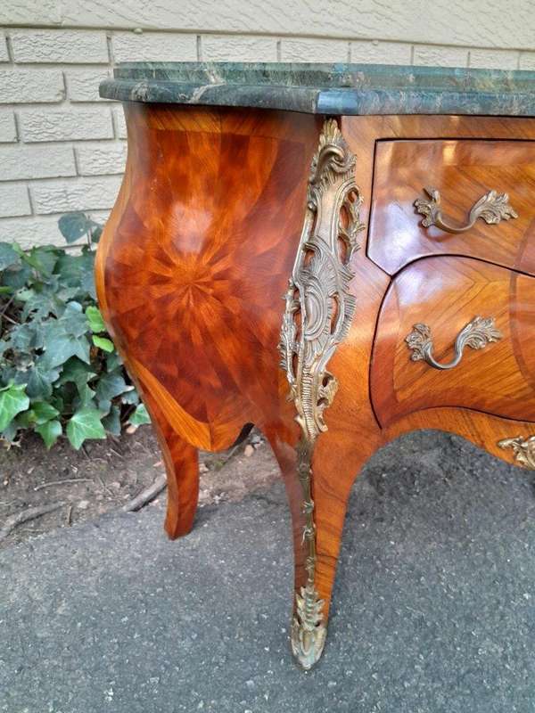 An  Antique 19th Century Pair of French Walnut Bombe Chest of Drawers with Marble tops