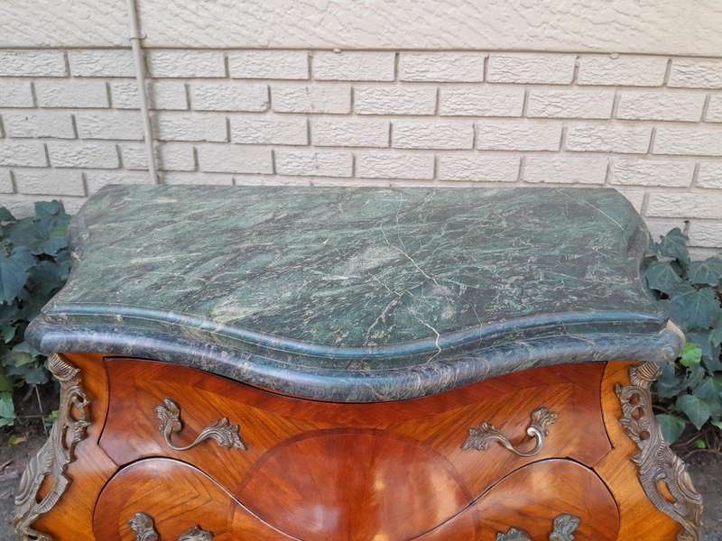 An  Antique 19th Century Pair of French Walnut Bombe Chest of Drawers with Marble tops