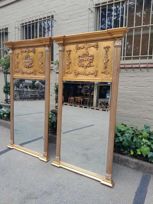 A 20th Century Pair of French Empire Style Giltwood Bevelled Mirrors