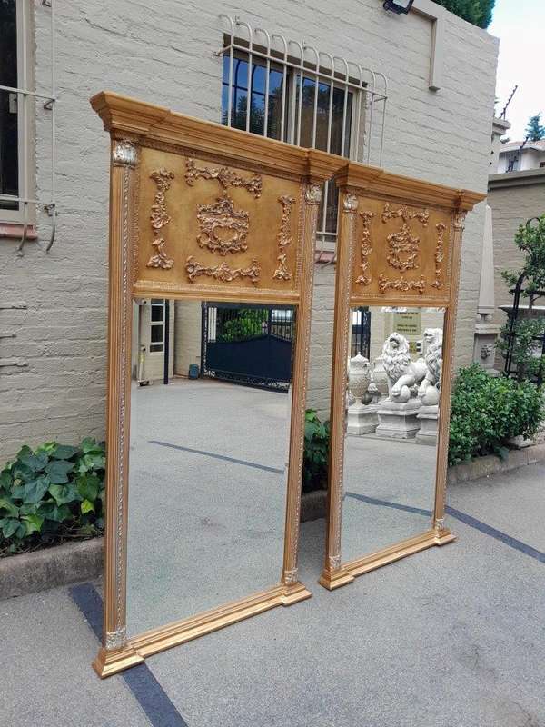 A 20th Century Pair of French Empire Style Giltwood Bevelled Mirrors