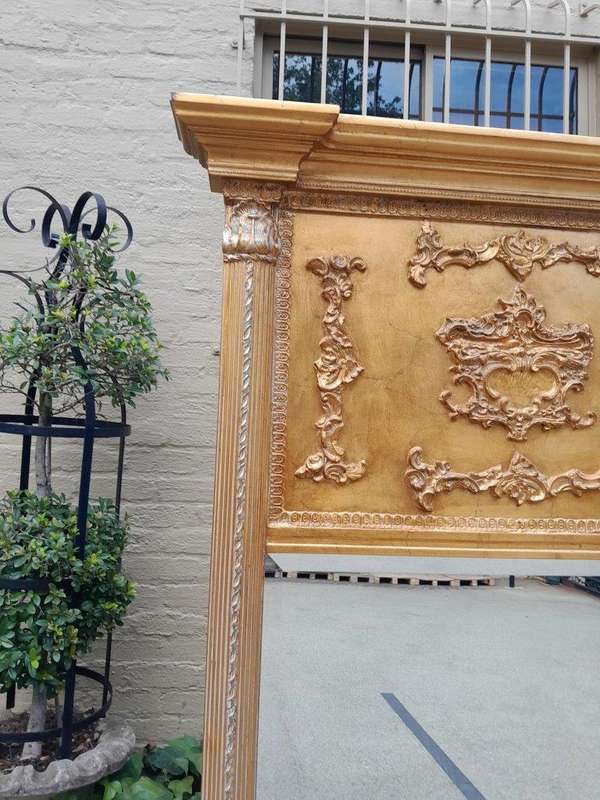 A 20th Century Pair of French Empire Style Giltwood Bevelled Mirrors