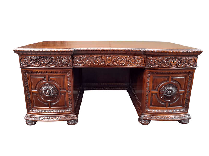 An Exceptional Antique And Rare 19th Century Carved Mahogany Desk
