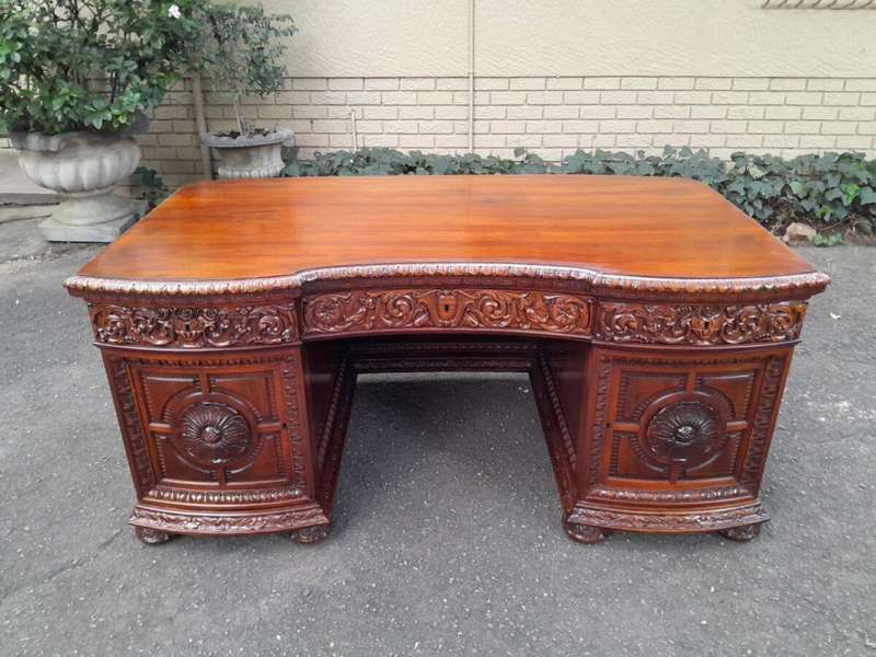 An Exceptional Antique And Rare 19th Century Carved Mahogany Desk