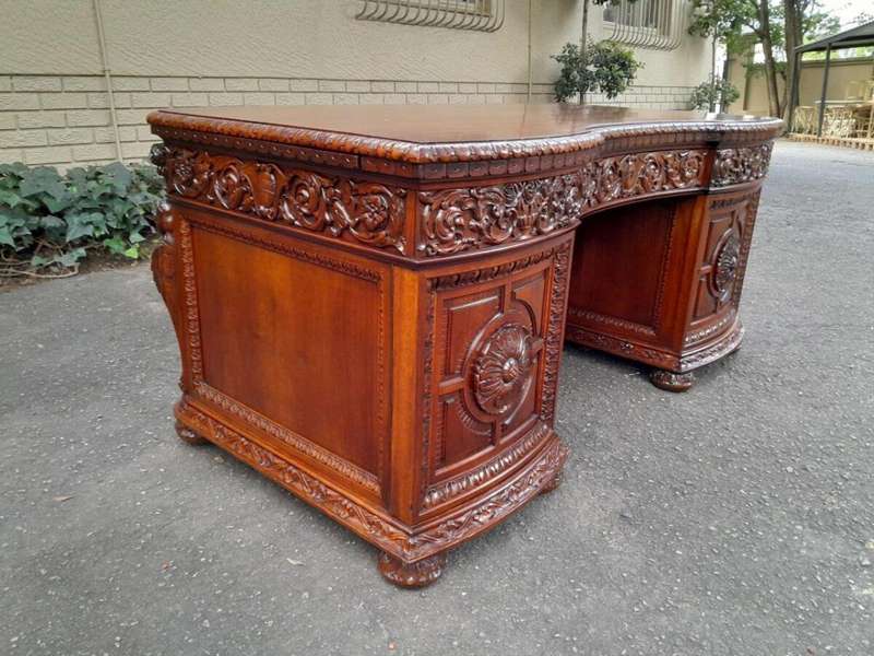 An Exceptional Antique And Rare 19th Century Carved Mahogany Desk