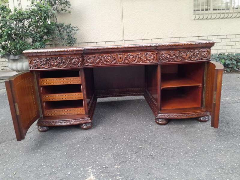 An Exceptional Antique And Rare 19th Century Carved Mahogany Desk
