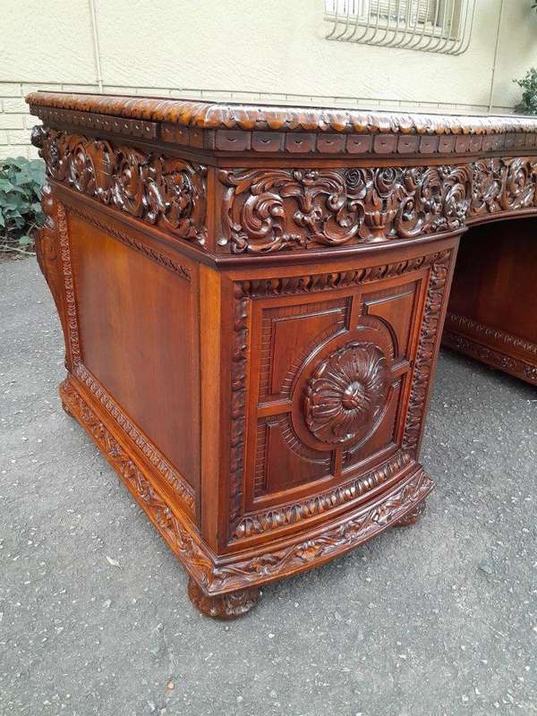 An Exceptional Antique And Rare 19th Century Carved Mahogany Desk